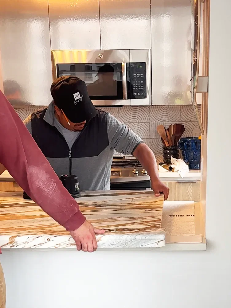 The Brilliant Rental Kitchen Hack: Layer a Real Marble Slab Right Over Your Existing Counters