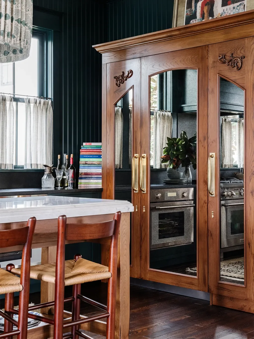 Inside a Florida Kitchen Whose Disguised Armoire Conceals a Refrigerator and a Hidden Pantry Passage